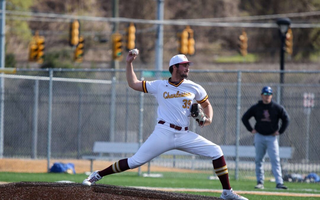 a baseball player throwing a ball